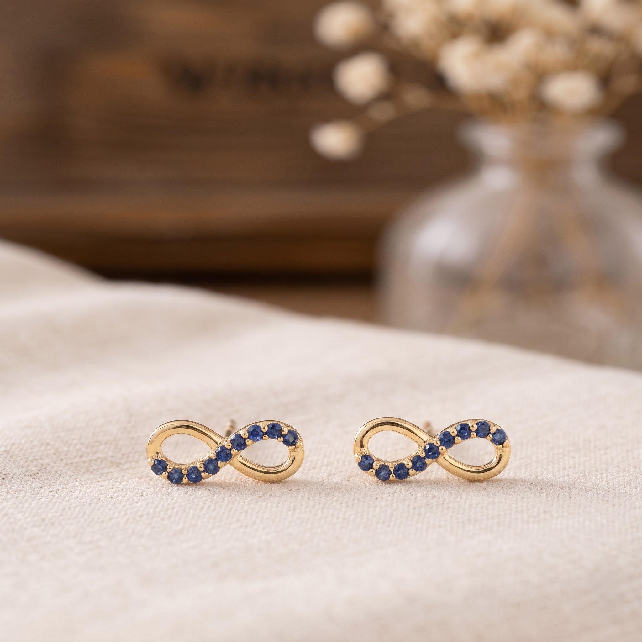 Blue Sapphire Infinity Stud Earrings