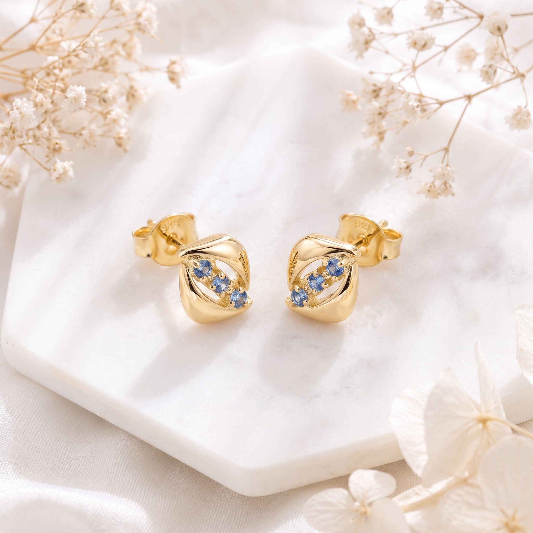 3-Stone Blue Sapphire Diagonal Wave Stud Earrings