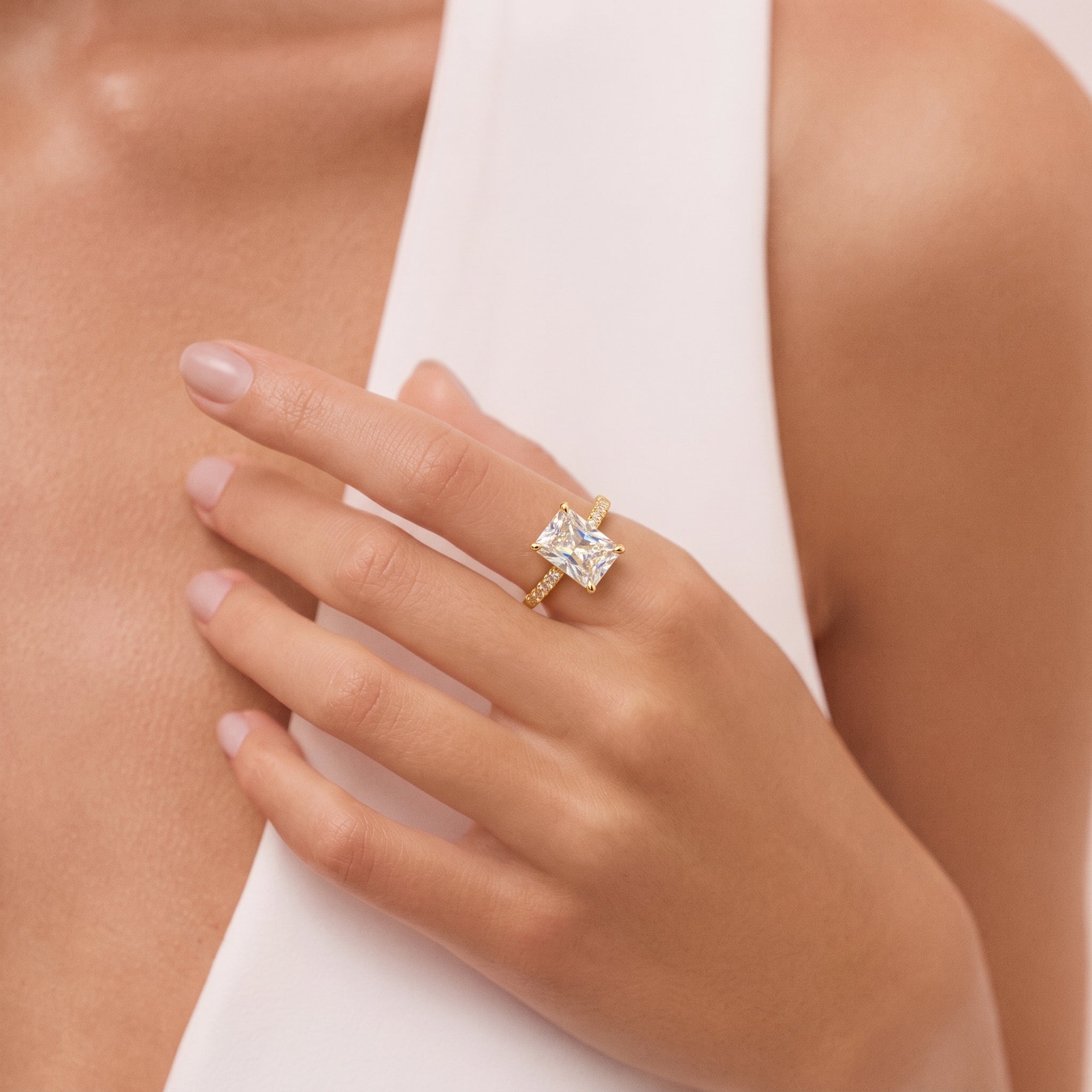 Radiant Cut Diamond Solitaire Ring with Pavé Band
