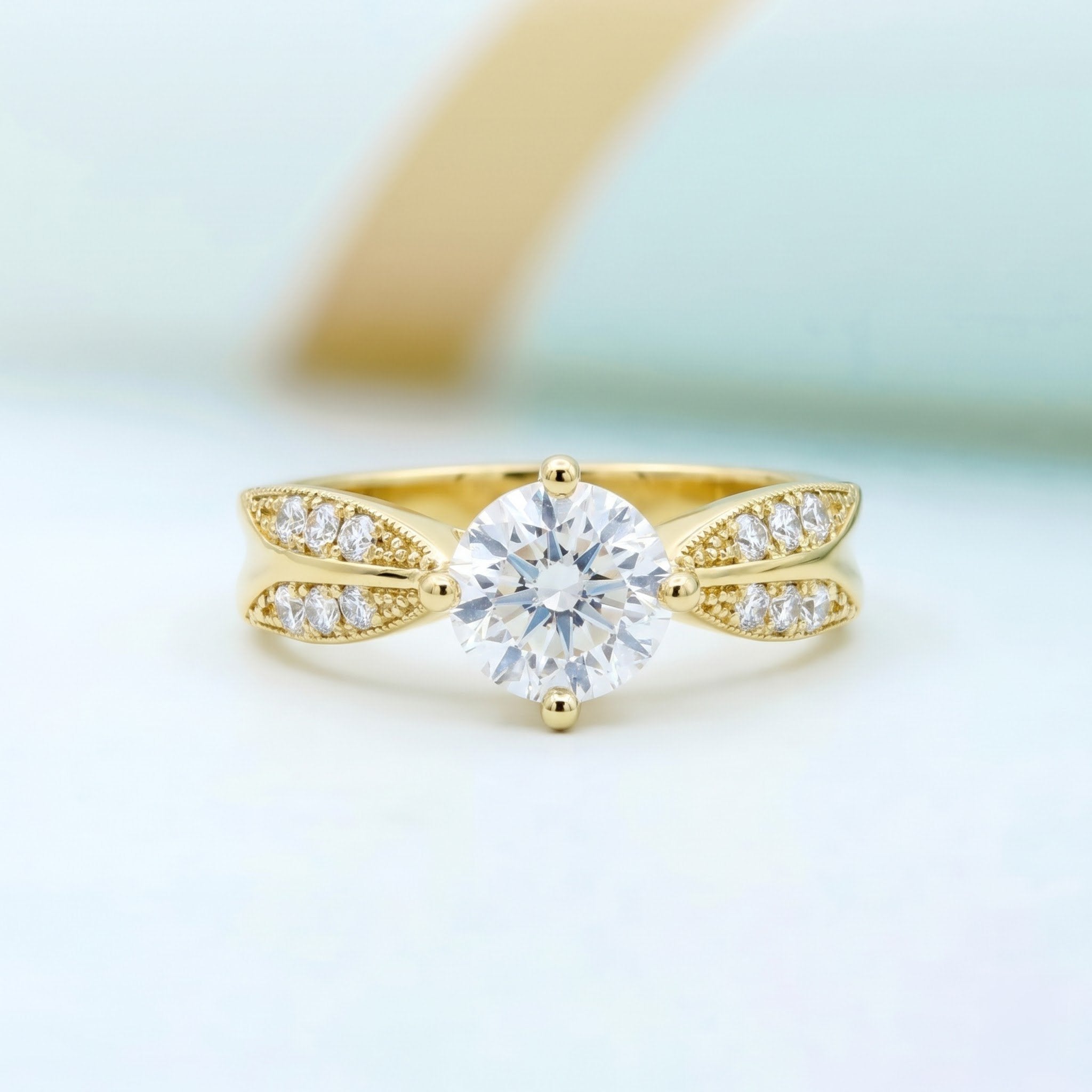 Round Cut Solitaire Ring with Split Pavé Shoulders