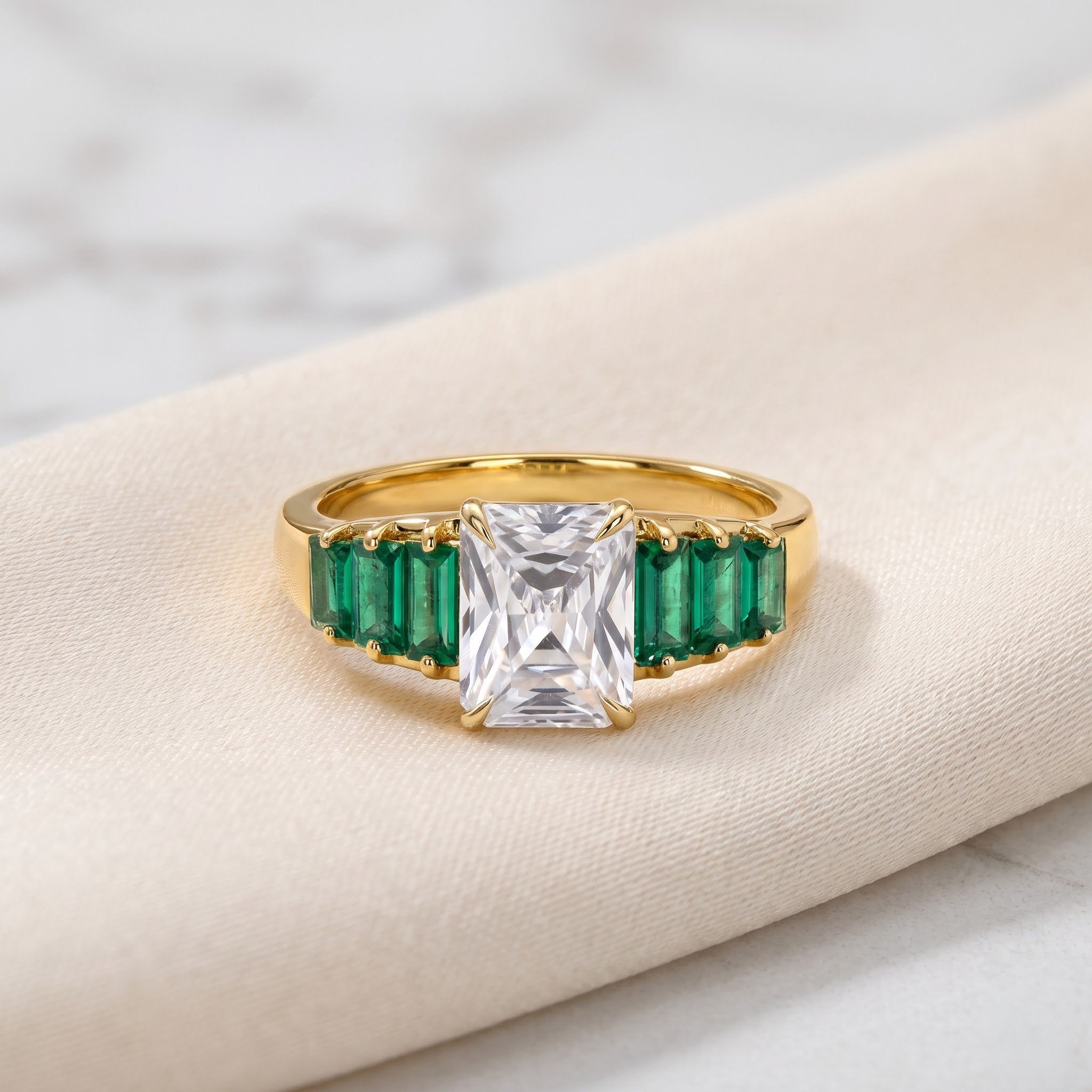 Radiant Cut Diamond Ring with Side-Stone Emerald Baguettes