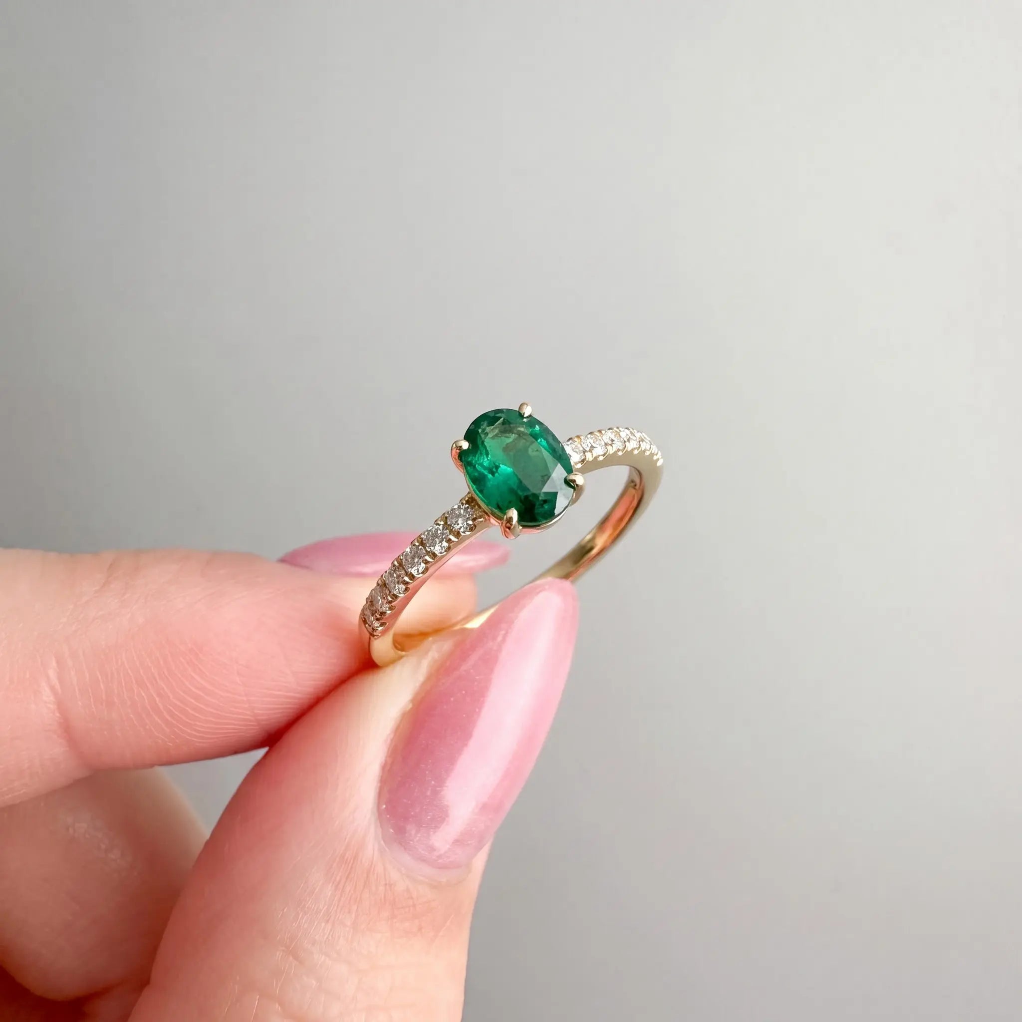 Oval Cut Green Emerald Ring with Pavé Band