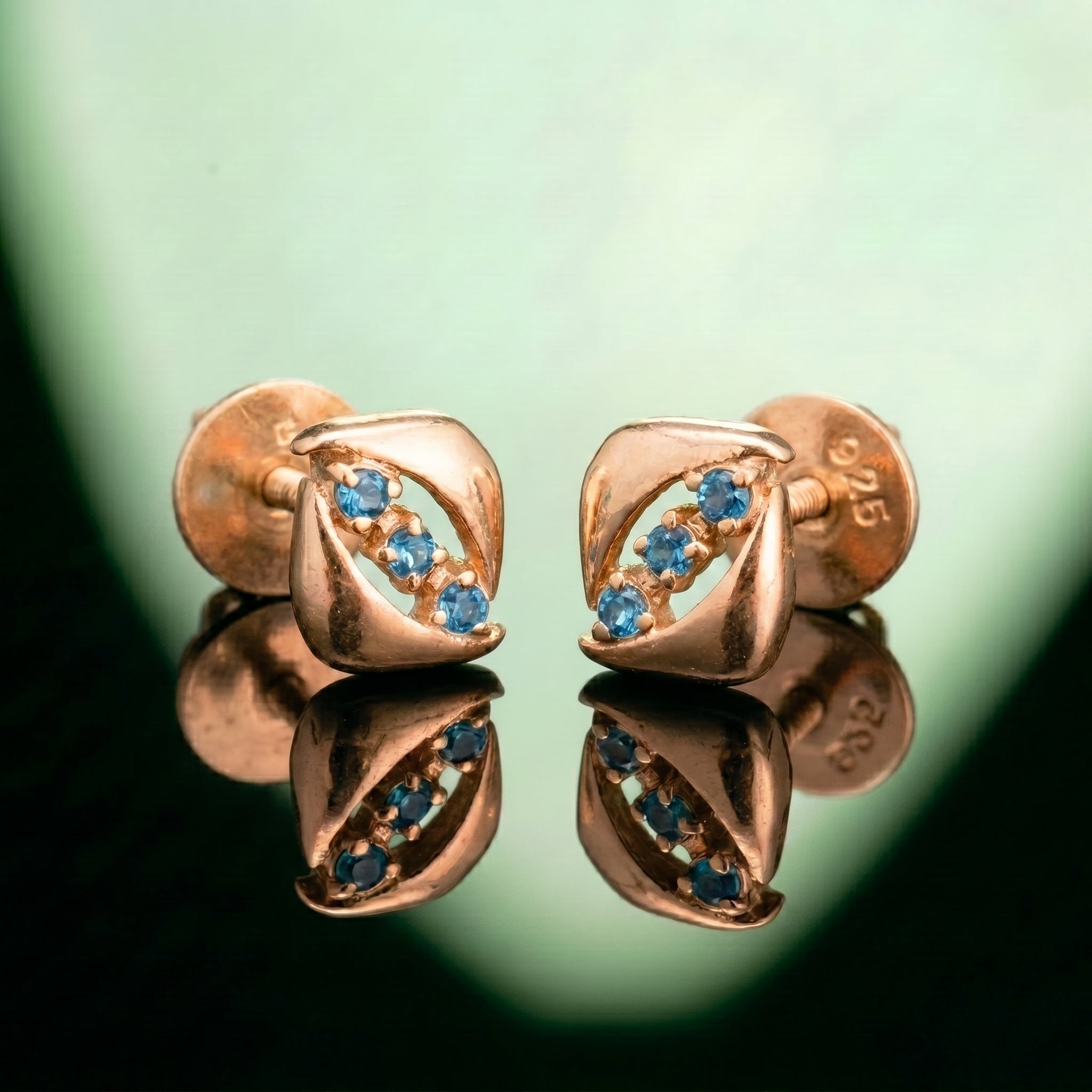 Silver Wave Blue Stone Stud Earrings
