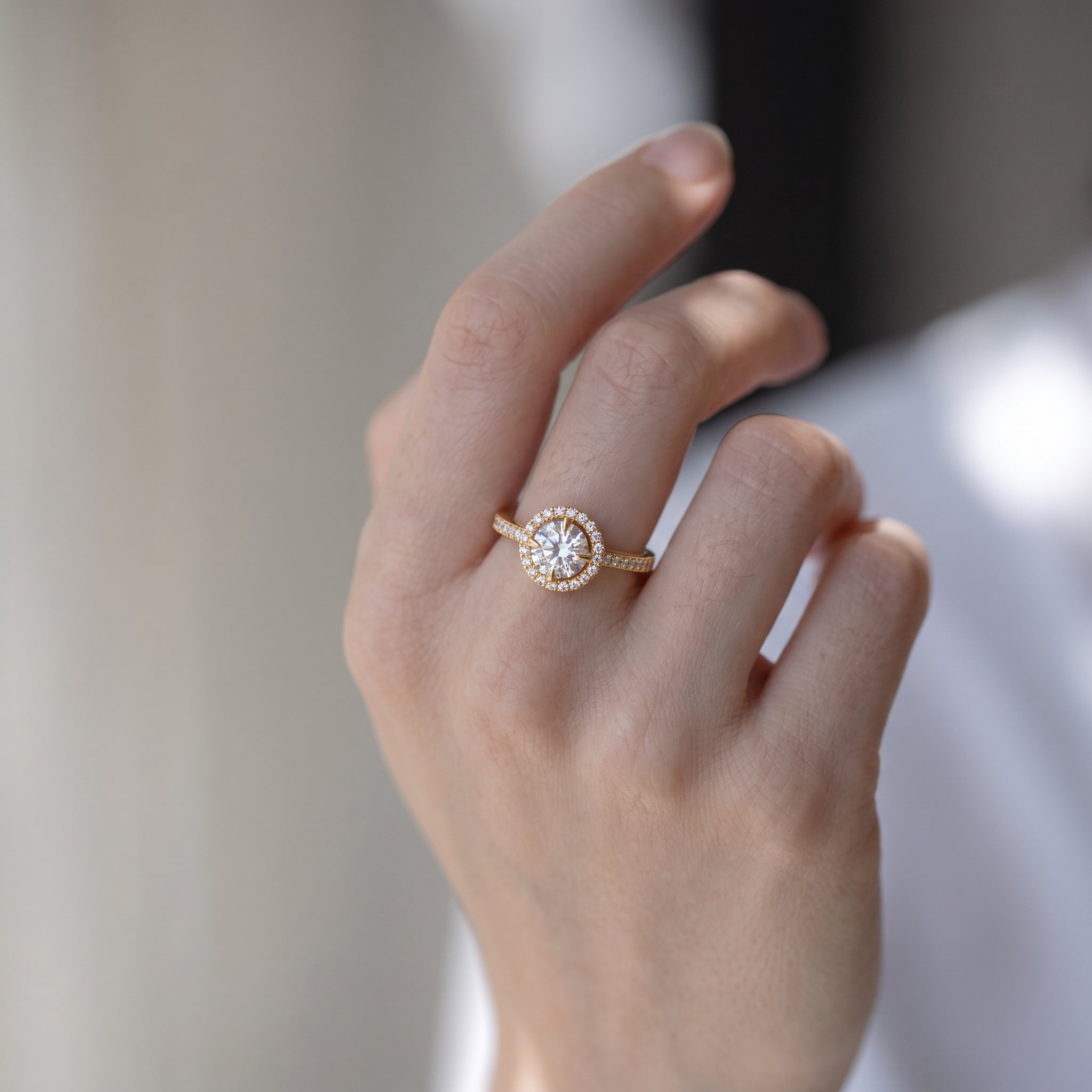 Round Cut Diamond Halo Ring With Pavé Band