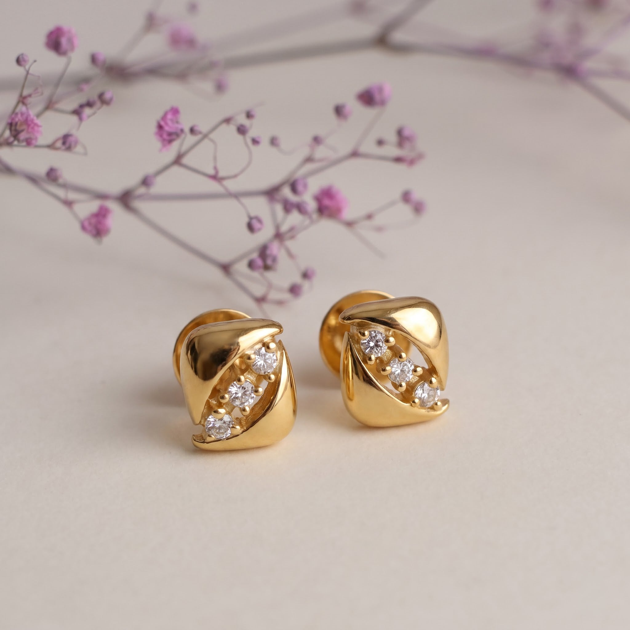 3-Stone Diagonal Diamond Wave Stud Earrings