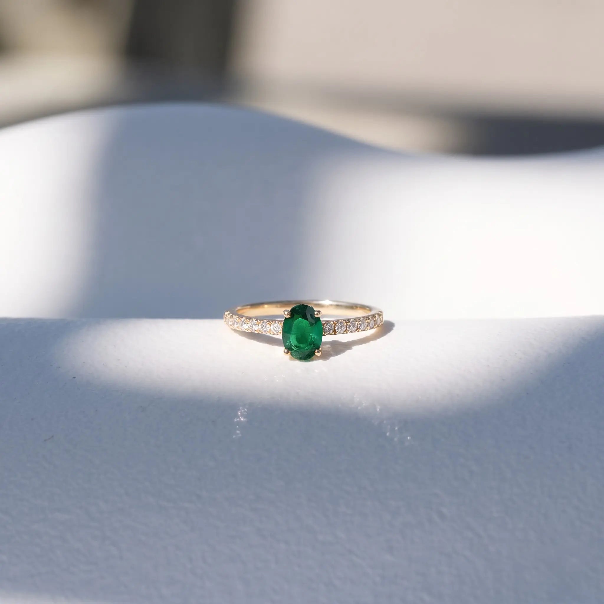 Oval Cut Green Emerald Ring with Pavé Band
